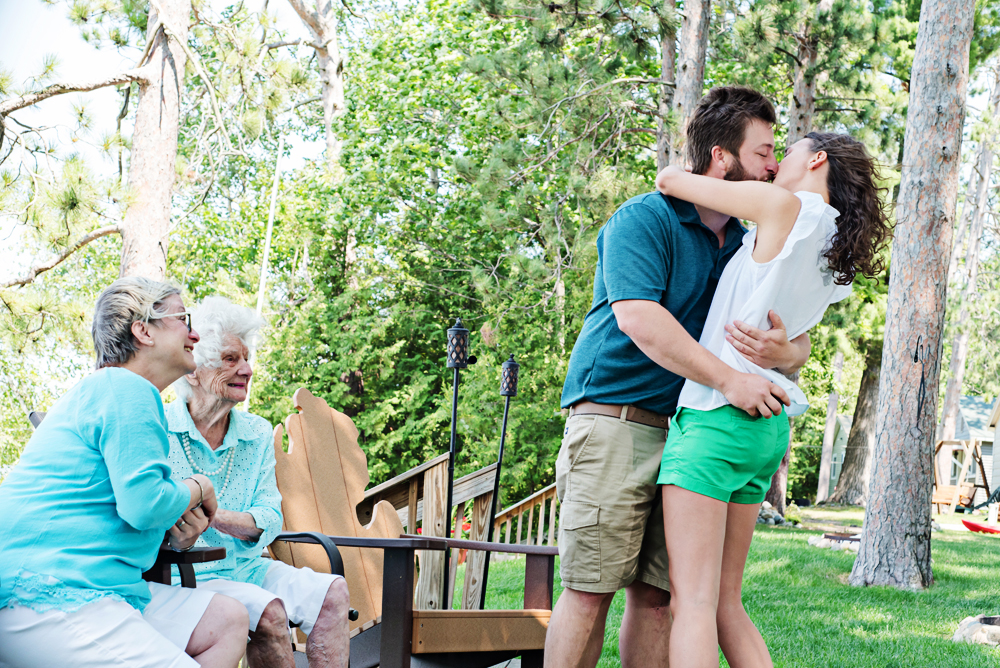 Engagement couple kissing