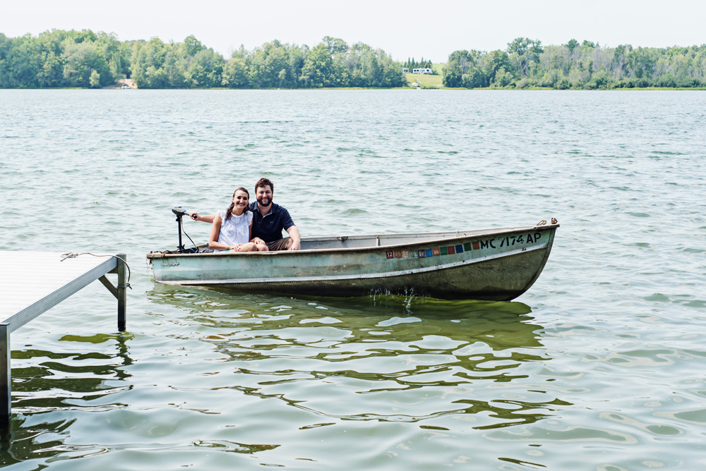 engagement couple on row boat