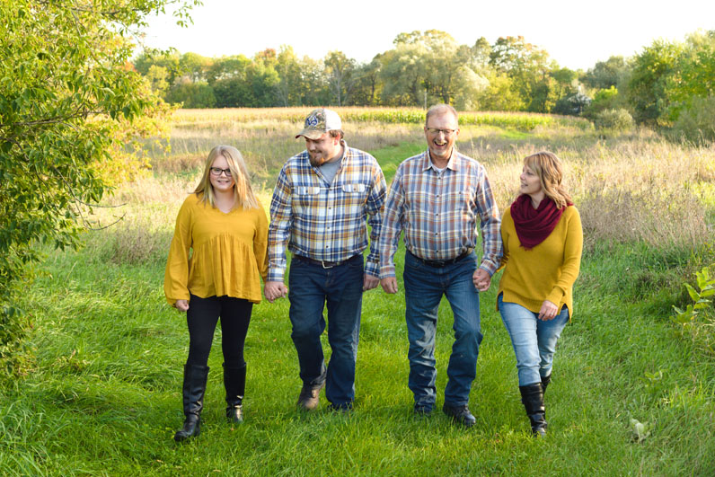 family of four enjoying a stress-free family session