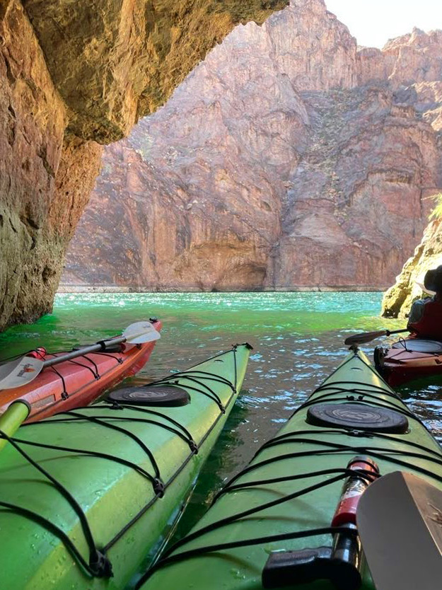 Kayaks in cave on Colorado River