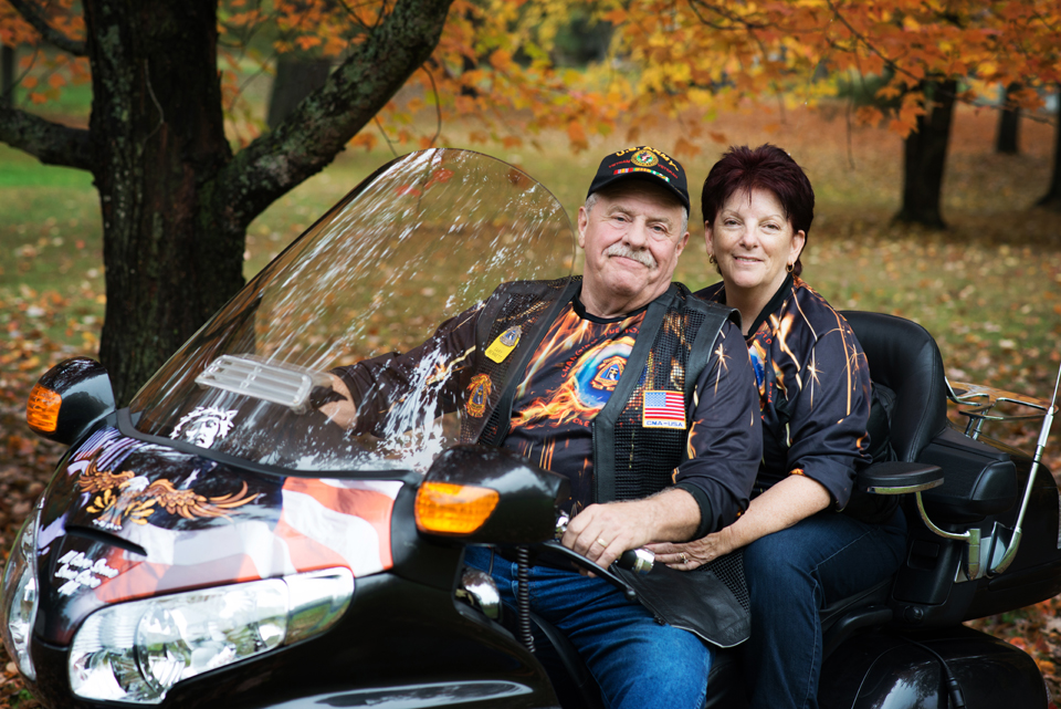 West Branch Couple on a motorcycle in the fall