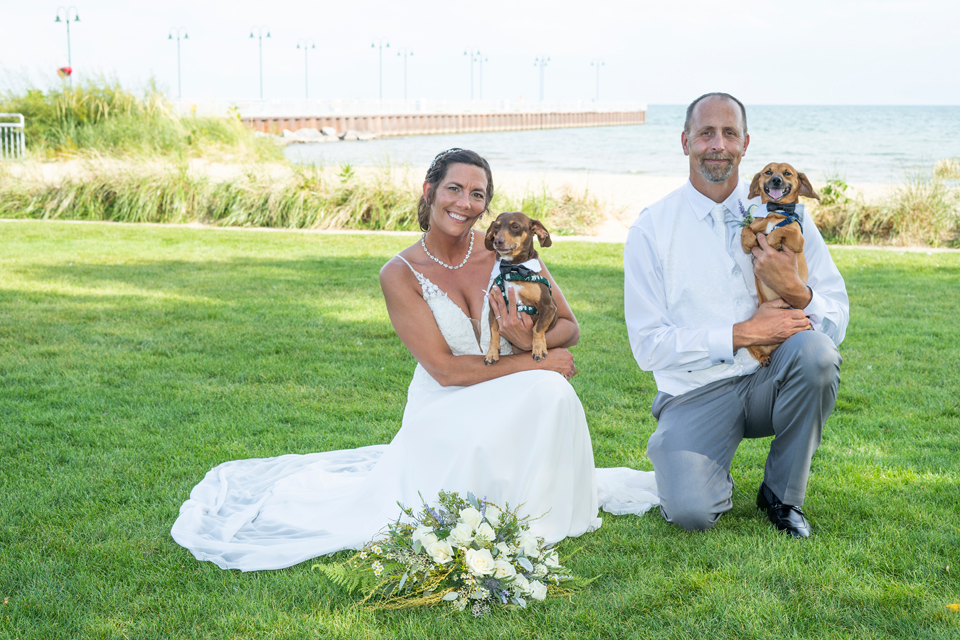 Tawas wedding ceremony, Bride and groom with dachshunds