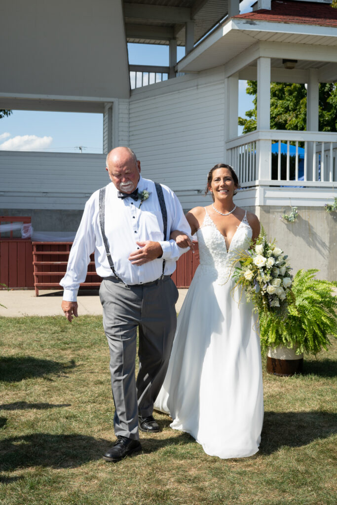 bride and father walking down aisle