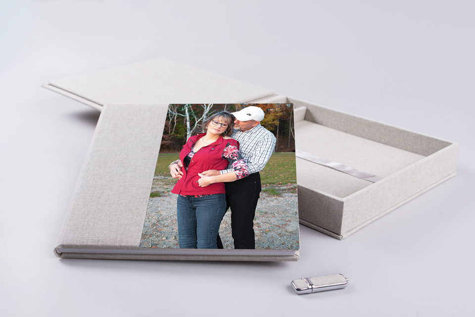 Album with image of a couple on cover with Box and USB included