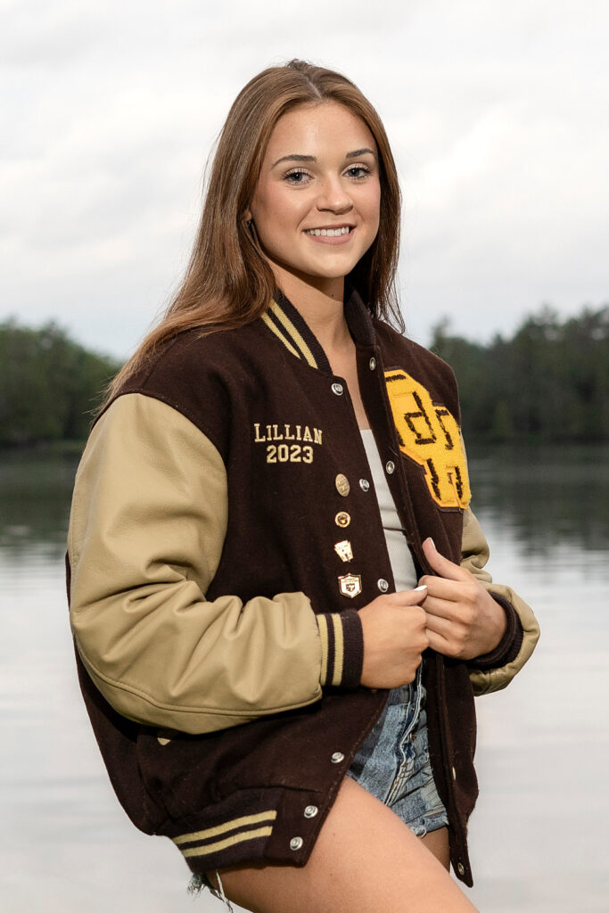 High School Senior Girl includes her Class Jacket.