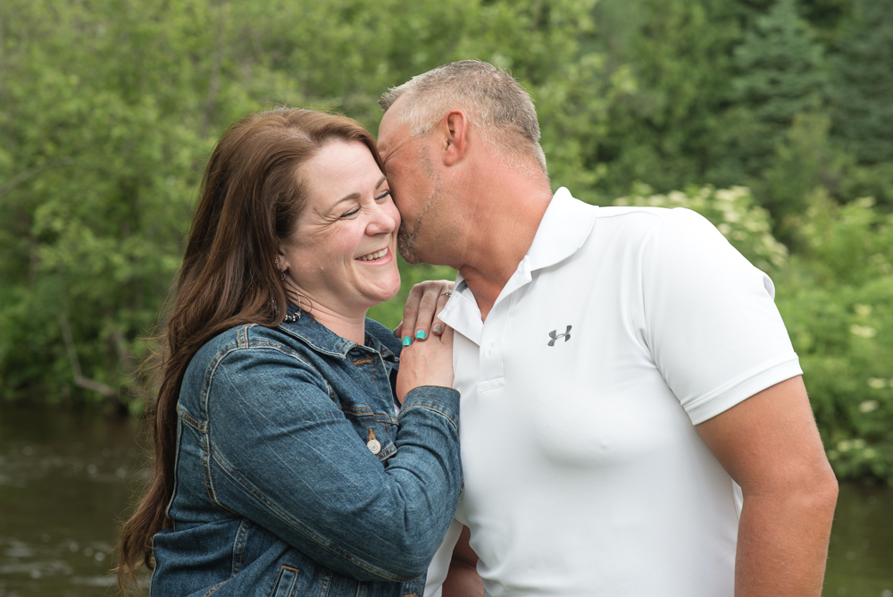 Engagement couple nuzzling