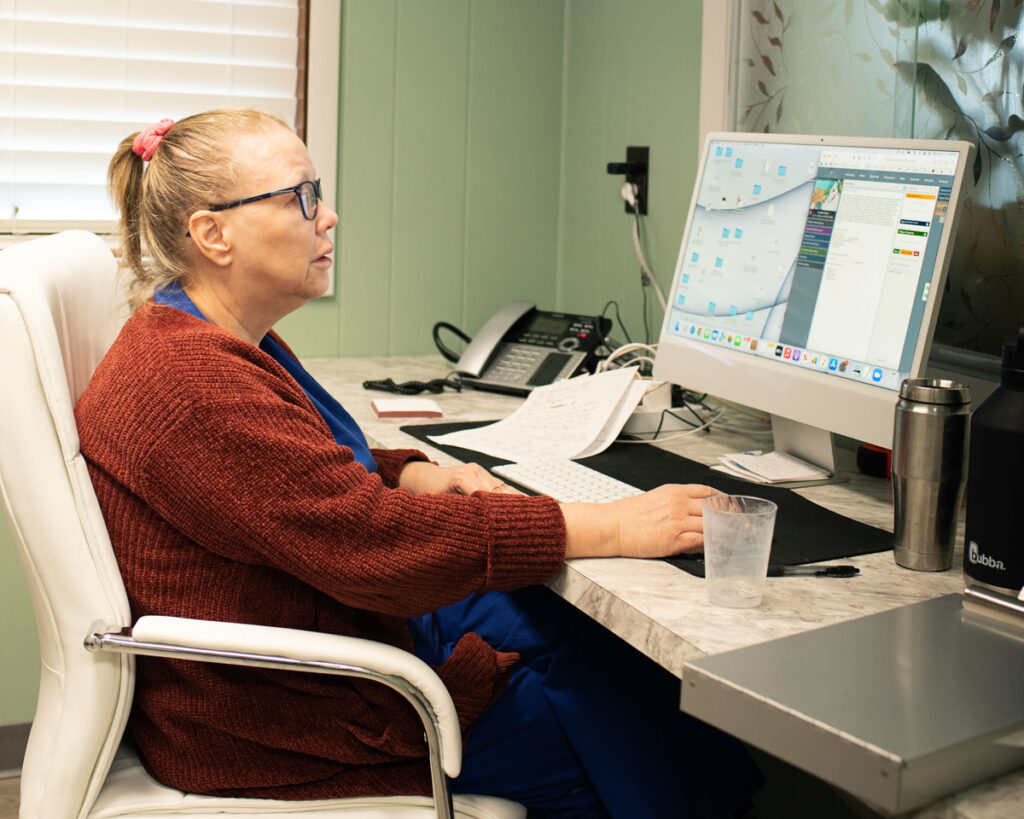 Doctor at desk at a branding session