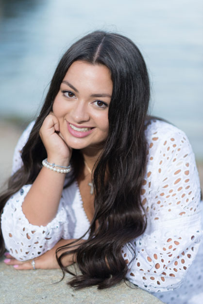 High School Senior with bracelets on her wrists.