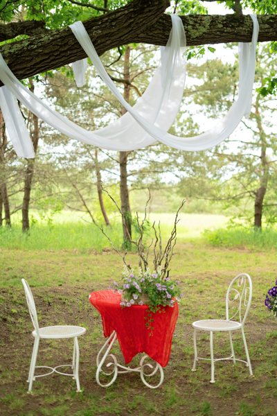 Table and chairs all set up for the first look of the bride and groom.