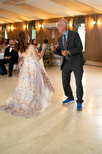 Father-daughter dance at a wedding reception.