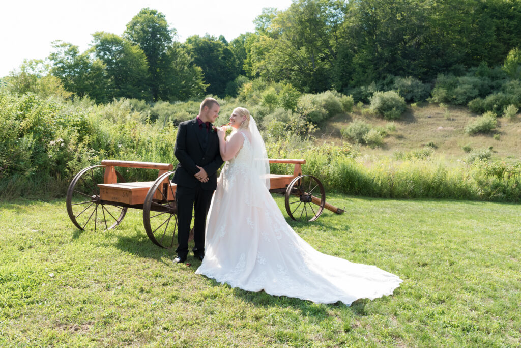 The Bunkhouse backyard with an antique wagon for wedding prop.