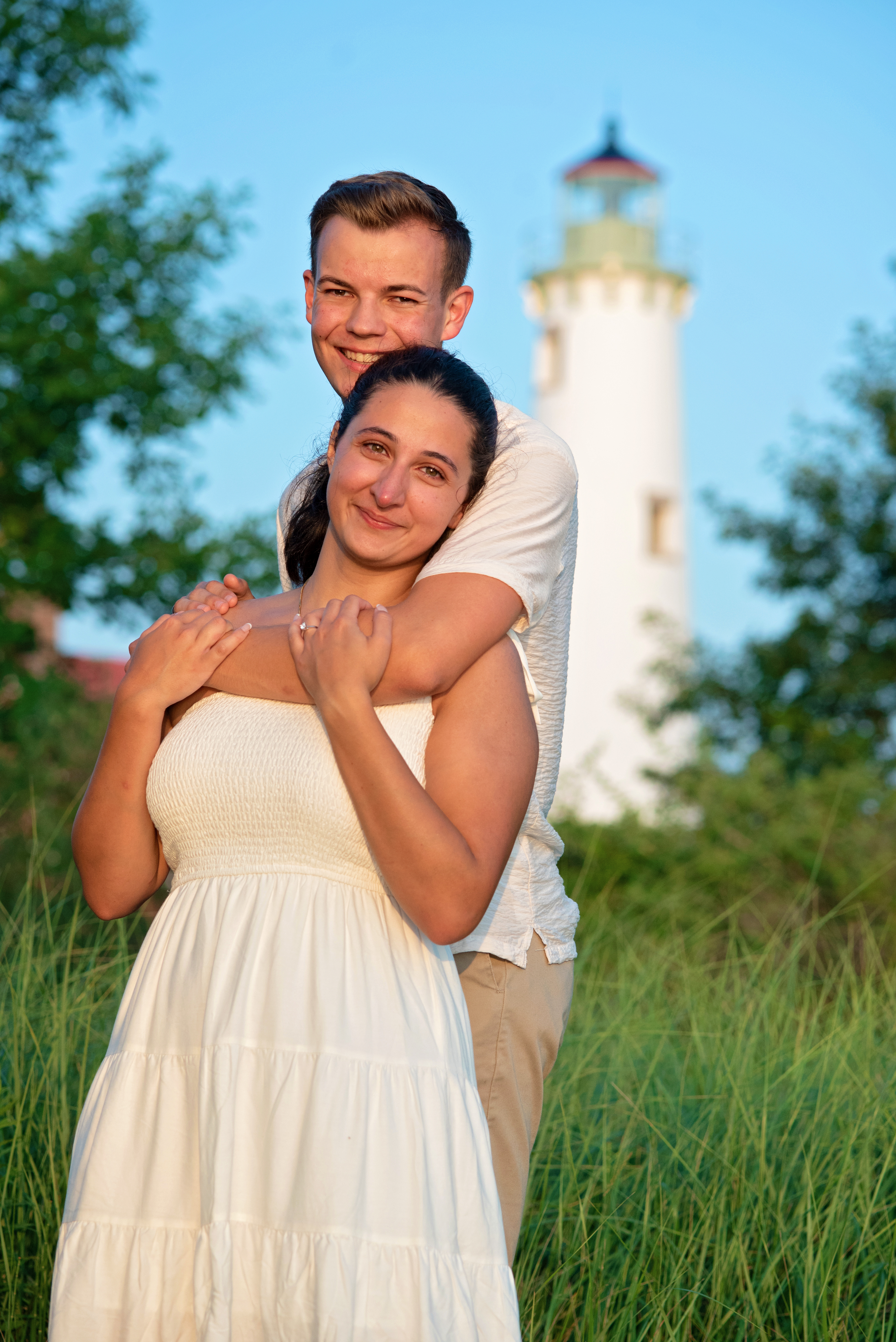 Proposal couple at Tawas Lighthouse