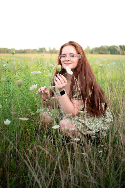 High School Senior Girl in Field of Flowers