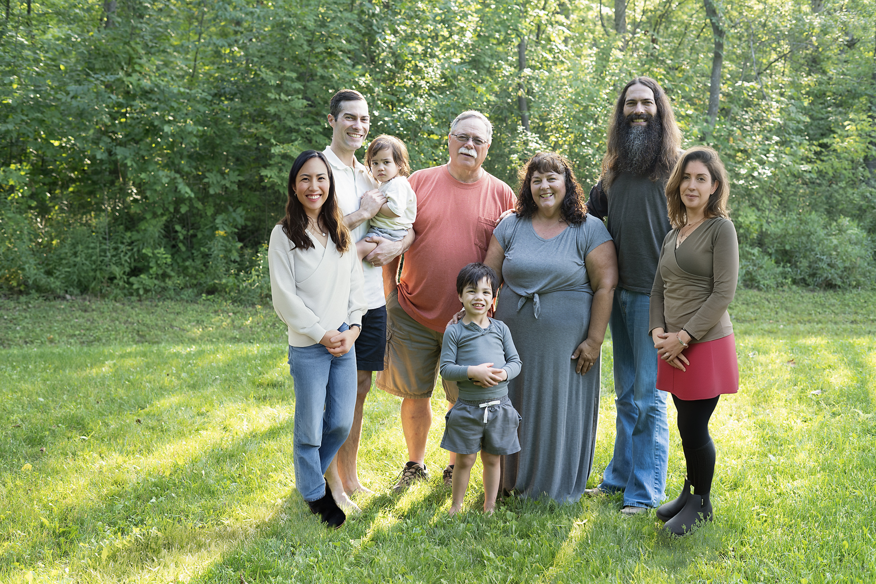 Shows a family photo session.